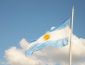 Argentina's flag blowing in the sky